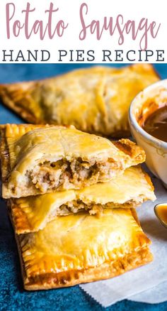 two pieces of sausage hand pies with dipping sauce in the middle and on top