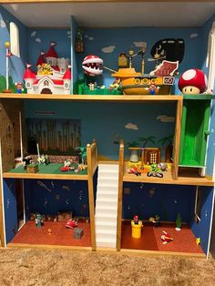 a doll house with lots of toys in it