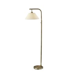 a floor lamp with a white shade on the base and a light bulb attached to it