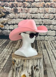 "PINK-fancy sturdy cowboy sombrero made in Mexico, has a soft feel surface, PINK Felt Cowboy Hat, Brim Size about 4.25\" Inches, with an elastic sweat bandana for a comfort fit, and incase a bit Big, includes a Rain Cover, all Made in Mexico." Western Pink Hat With Curved Brim, Western Style Pink Hat With Curved Brim, Pink Wide Brim Hat For Rodeo, Pink Brimmed Hat For Rodeo, Pink Curved Brim Hat For Rodeo, Pink Western Felt Hat With Curved Brim, Pink Western Style Felt Hat With Curved Brim, Fitted Pink Hat For Rodeo, Pink Fitted Hat For Rodeo