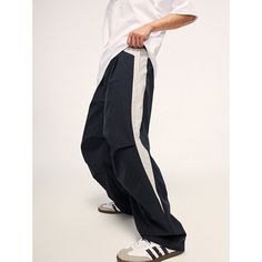 Loose Retro Color-Block Sports Wide-Leg Pants Material: 100%Polyester Size: S, M, L, XL Color: Navy Blue, Purple Applicable Scene: Leisure, Daily, Vacation Blue Wide Leg Bottoms With Contrast Color, Casual Cotton Parachute Sports Pants, Casual Activewear With Side Stripes And Relaxed Fit, Casual Relaxed Fit Cargo Pants For Gym, Casual Cotton Parachute Pants For Sports, Sporty Straight Leg Sports Bottoms, Streetwear Bottoms With Contrast Color And Long Pants, Casual Straight Leg Parachute Pants For Sports, Sporty Wide Leg Bottoms With Contrast Color