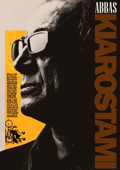 an old man with glasses on his face in front of a yellow and black poster