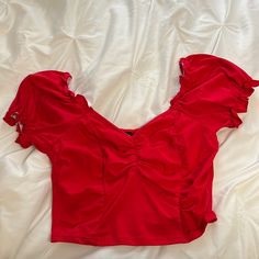 Ruffled Top, Brand New Without Tags But Has Never Been Worn, In Great/New Condition And Fits Size Small But Is Stretchy! Trendy Red Ruffled Blouse, Red Stretch Ruffle Tops, Red Ruffled Stretch Tops, Trendy Red Top With Ruffles, Flirty Red Top With Ruffles, Chic Red Top With Ruffle Hem, Fitted Ruched Red Blouse, Ruffled Top, Red Top