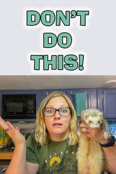 a woman holding a ferret in her hands with the caption don't do this