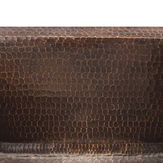 an image of a brown snake skin pattern on the back of a couch or chair