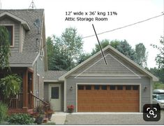 the garage is located in front of the two story house