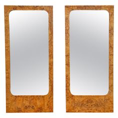 a pair of mirrors sitting next to each other