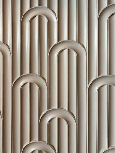 an abstract wallpaper design with curved lines and rings on it's sides, in neutral tones