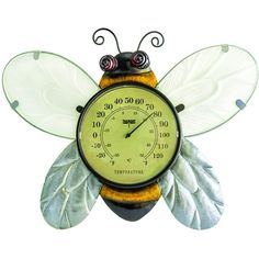 a clock shaped like a bee with wings on it's body and face, sitting in front of a white background