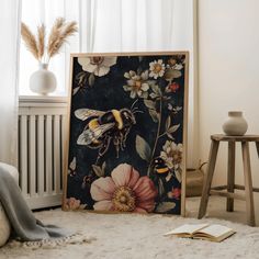 a painting with flowers and a bee on it