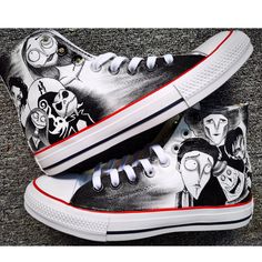 the shoes are painted with cartoon characters on them, and have been worn by someone