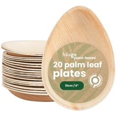 wooden plates stacked on top of each other with the words 20 palm leaf plates printed on them