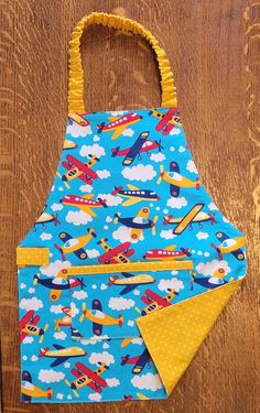 a child's bib with an apron on it