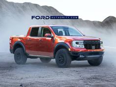 a red truck driving down a dirt road next to a mountain covered in fog and dust