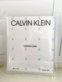 a close up of a plastic bag on a counter with the words calvin klein