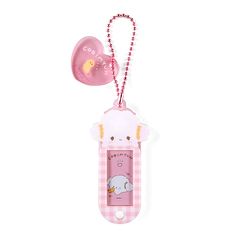 a pink pacifier with an animal on it's back hanging from a string