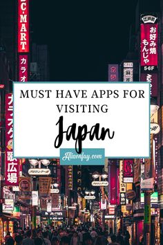 the words must have apps for visiting japan on top of a city street at night