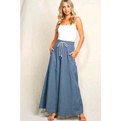 Denim Style Palazzo Pants In A Lightweight Fabric For The Warm Weather. These Are So Flattering On All Body Types And Are So Cute With A White Tank And White Flips Or Sandals. It Would Also Go Great With One Of My Ahdorned Bags. These Are All Nwt And Come In Different Sizes. Summer Cotton Medium Wash Pants, High Waist Medium Wash Cotton Bottoms, Summer Medium Wash Cotton Pants, Medium Wash High Waist Cotton Bottoms, Summer Dark Wash Cotton Pants, Dark Wash Cotton Pants For Summer, Blue Cotton Bottoms For Day Out, Spring Denim Bottoms Long Pants, Summer Denim Wide Leg Pants With Elastic Waistband