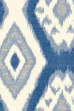 a blue and white pattern on fabric