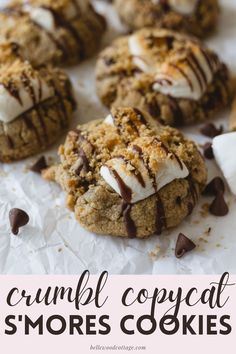 several cookies with white chocolate drizzled on top and the words crumbl copypat s'mores cookies