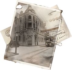 an old photo of a building with a trolley on the street