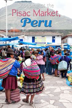 the people are shopping at the market in peru