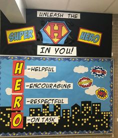 a bulletin board with superheros on it in a classroom hallway or playroom for children