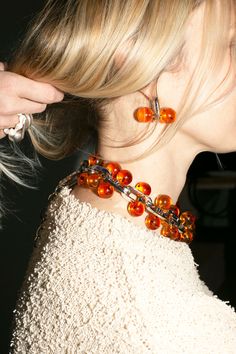 A chunky, linked statement necklace punctuated with amber colored beads. About 19" long including the clasps. Sphere Earrings, Saturn Necklace, Jewelry Product Shots, Jewelry Photography Styling, Chunky Bead Necklaces, Big Balls, Ball Necklace, Jewelry Photography, Diy Necklace