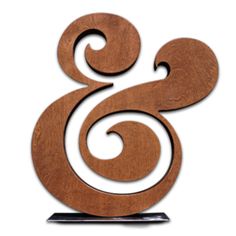 a wooden sign that is shaped like an ampel and has swirls on it