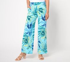 A packable beach pant? You bet! Just add a sleeveless tee, a pair of sandals, and some sunnies and let the vacay begin! But these wide-leg bottoms offer so many more outfit options. Errands around town, backyard barbecues, family reunions, or Sunday brunch -- they're the perfect pick for whatever's on your agenda. The smartly smocked waistband makes tops so tuckable, too! From Denim & Co.® Fashions. Tropical Blue Bottoms For Summer, Blue Summer Pants For Vacation, Beachy Summer Bottoms For Vacation, Blue Pants For Summer Vacation, Summer Vacation Blue Pants, Tropical Style Summer Pants With Elastic Waistband, Summer Pants With Tropical Print For Spring, Tropical Print Pants For Summer, Casual Tropical Print Pants For Vacation