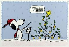 a charlie brown christmas card with a dog playing the piano and singing to lemon tree