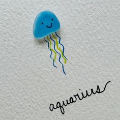 a blue jellyfish with the word aquarius written on it's back side