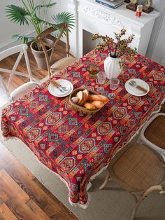 the table is covered with a colorful cloth