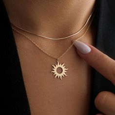 14k Gold Sun Necklace , Minimalist Sun Necklace, Tiny Sun Necklace, Dainty Sun Jewelry, Birthday Gift, Bridesmaid Gifts Introducing our elegant Sun Necklace, a perfect blend of simplicity and style. Crafted with a radiant sun pendant, this piece symbolizes warmth, light, and positivity. Made from high-quality materials, it's designed to be durable and hypoallergenic, ensuring comfort for everyday wear. The minimalist design makes it a versatile addition to any jewelry collection, ideal for layering or wearing solo. Whether you're gifting it to a loved one or treating yourself, this necklace adds a touch of celestial charm to any outfit. Perfect for birthdays, holidays, or special occasions! Material: * Material: High quality solid 925 Sterling Silver * Plating: Sterling Silver, 18K Gold, R Gold Sun Necklace, Sun Jewelry, Rose Gold Gifts, Sunshine Necklace, Garnet Birthstone, Gold Gift Boxes, Sun Necklace, Sun Pendant, Celestial Necklace