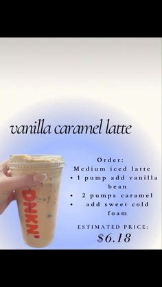 a person holding up a cup with the words vanilla caramel latte on it