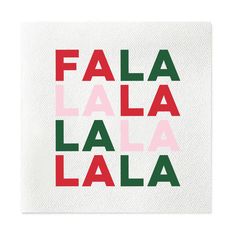 a white napkin with red and green lettering on it that says fala la la