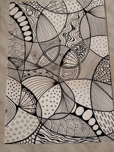 a black and white drawing on a piece of paper