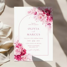 a wedding card with pink flowers on it