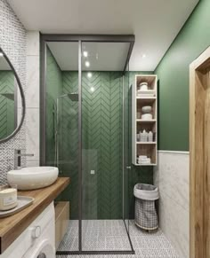 a bathroom with green and white walls, wooden flooring and a walk in shower