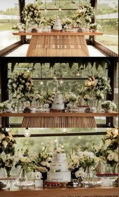 a wooden table topped with lots of white flowers and greenery next to a cake