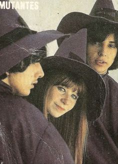 three young women wearing purple hats and scarves in front of a white background with the words mutantes written on it