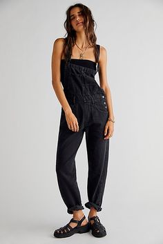 So essential and forever timeless overalls from our We The Free collection. **Fit:** Relaxed, slouchy silhouette **Features:** Bib-and-brace design, tapered legs, exaggerated bib pocket detail, rigid denim fabrication, varied distressing throughout **Why We | We The Free Ziggy Denim Overalls at Free People in Black, Size: L Overalls For Women, Overall Jumpsuit, Black Overalls, Trendy Denim, Tapered Leg Jeans, Jean Pants, Jumpsuit Pattern, Classic Casual, Long Jumpsuits