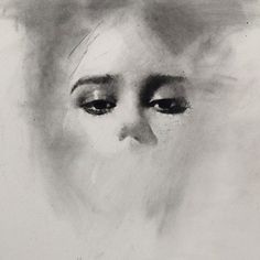 a black and white drawing of a woman's face with her eyes wide open