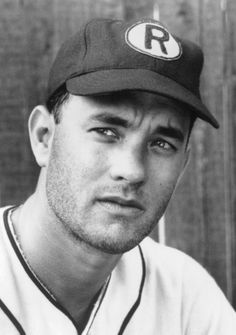 a black and white photo of a baseball player