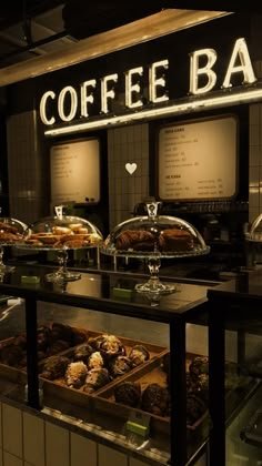 a coffee bar filled with lots of pastries