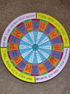 a colorful wheel of fortune with words written on it