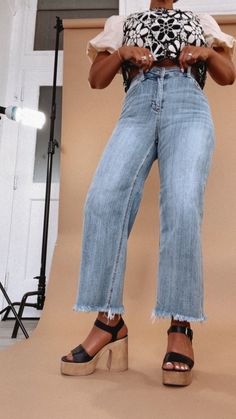 Lean and modern in our famous stretchhhhhhy but holds-you-in denim, these vintage-looking jeans kick out into a cropped mini-flare that works with flats and heels. Wide leg denim Risen Denim Frayed hem Medium wash Fabric 71.9% Cotton 26.9 % Polyester 1.2% Spandex Rise 11" | Inseam 25.5" in size 3/26 Model Specs: Karli + Emily are wearing a size 1 in the photo.How will this item fit you? Check out our MODEL SPECS (Typical Sizing - Karli: S-Size 5/26 - 5ft 2in, Emily: S-Size 3/25 - 5ft 5in, Syd: L/XL- Size 15/ - 5ft 8in)Need help with sizing? No problem! Join our VIP group on Facebook, Everyday Chic Boutique VIP Insiders to chat directly with our team and other customers just like you.Packaged with love and shipped from our warehouse in Wilmington, Ohio Style Wide Leg Jeans, Bride Top, Vip Group, Jeans Fabric, Everyday Chic, Exclusive Dress, Dresses By Length, Wide Leg Denim, Bottom Clothes