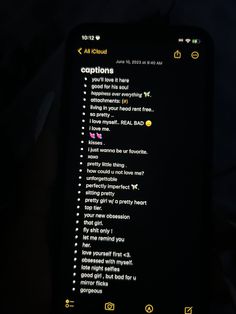 a cell phone with text on it in the dark