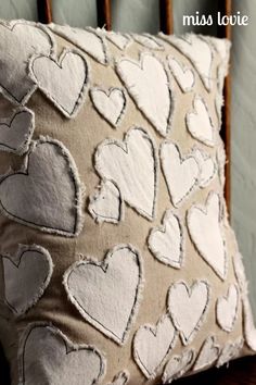 there is a pillow that has hearts on it