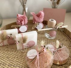 some pink and white items on a wicker tray